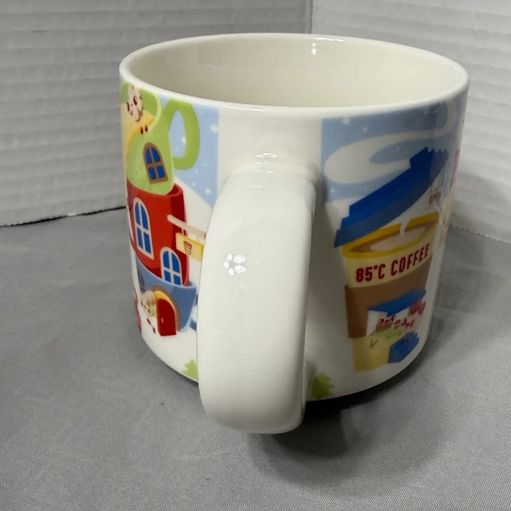 85 Degree Bakery Cafe Collectible Ceramic Mug Cup with Festive Village Design